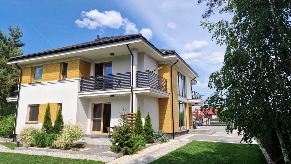 Modernistyczny dom nad jeziorem z funkcją pensjonatu - 1