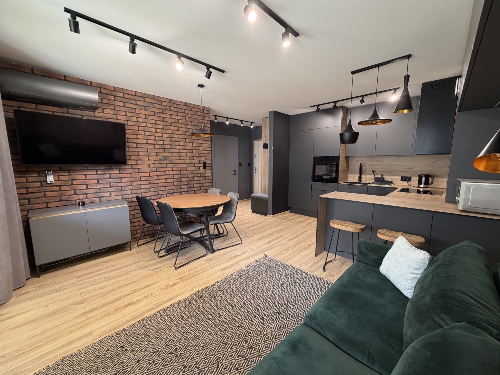 Stylowe mieszkanie 43 m² z klimatyzacją i garażem podziemnym, duży salon z kuchnią + sypialnia, w pełni wyposażone - 0